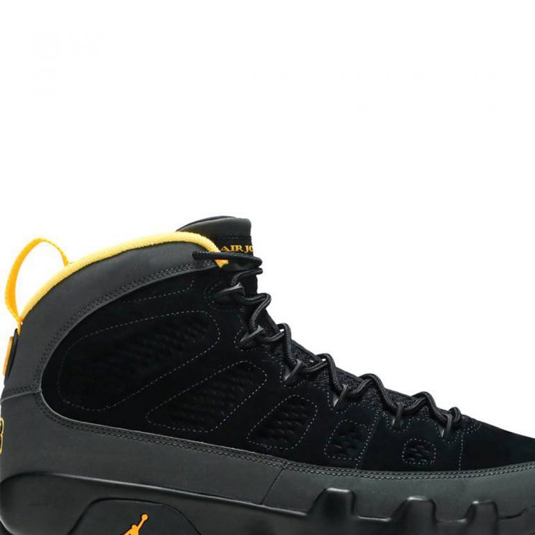 dark charcoal university gold shirt