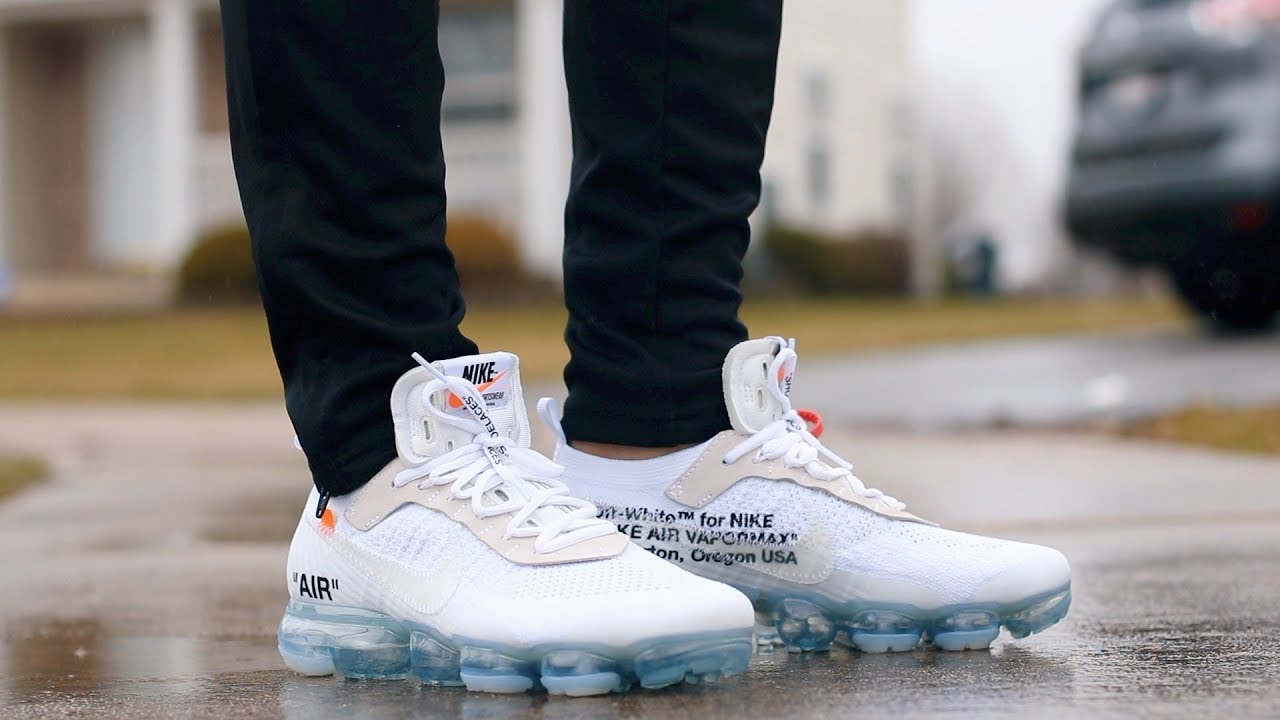 white vapormax with blue bottom