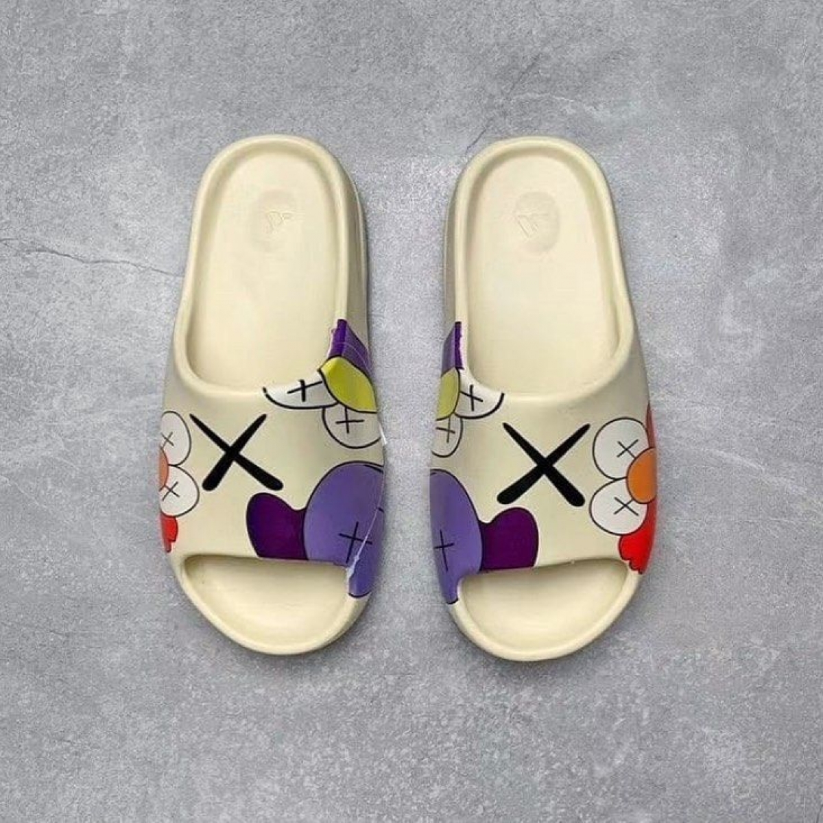 yeezy slide x kaws
